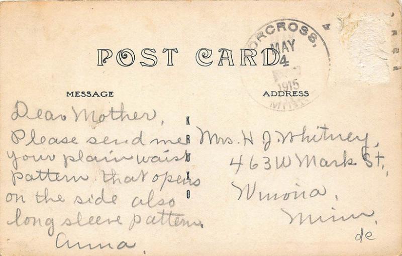 Wheaton MN Bird's Eye View Store Fronts in 1915 RPPC Postcard