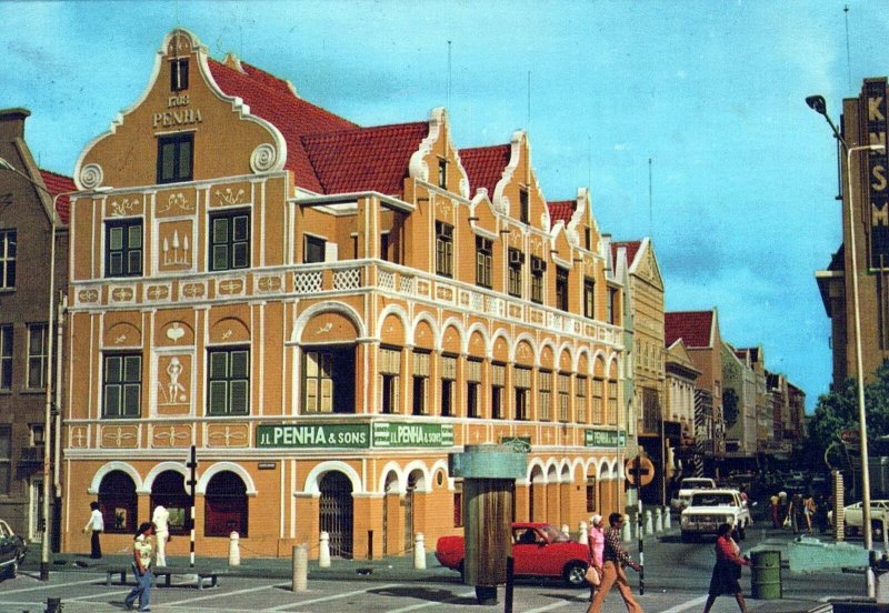 VINTAGE CONTINENTAL SIZE POSTCARD STREET SCENE & PENHA BUILDING CURACAO