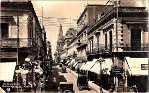 RPPC Postcard Av. 16 de Sept Guadalajara Mexico Shops Old Cars Street Scene 1931
