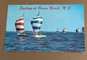 VINTAGE UNUSED POSTCARD SAILING AT OCEAN BEACH, N.J.