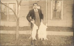 Champaign IL Cancel Man Hunting Holding Dead Rabbits & Gun Real Photo Postcard