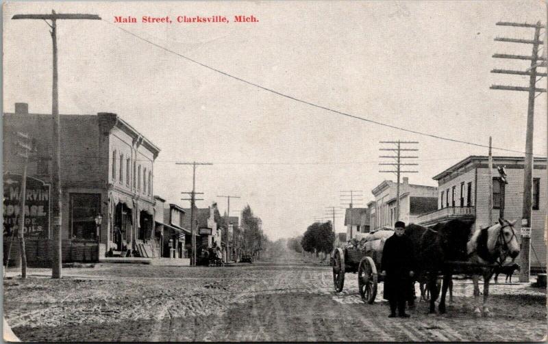 Clarksville Michigan~Dirt Main Street~Marvin Hardware~Man w/Loaded Wagon~c1910 