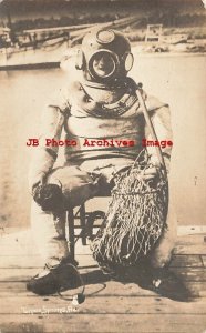 FL, Tarpon Springs, Florida, RPPC, Hard Hat Sponge Diver on Dock with Netting