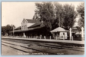 Bismarck ND Postcard RPPC Photo NP Depot Railroad Train Soldiers Sailors c1910's