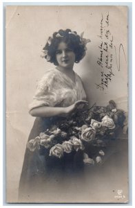 Pretty Woman Postcard RPPC Photo Curly Hair With Flowers c1910's Posted Antique