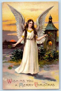c1910's Christmas Angel With Holly Berries Church Winter Scene Embossed Postcard