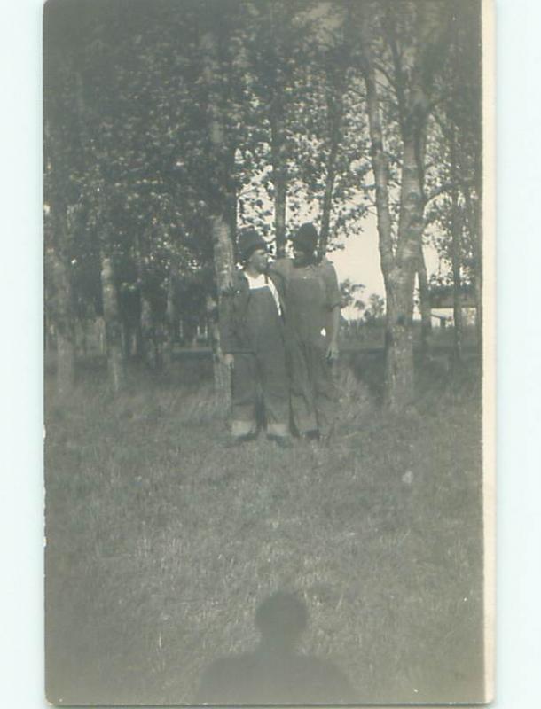 circa 1910 rppc POSSIBLE GAY INTEREST - MEN IN OVERALLS HUGGING o2701