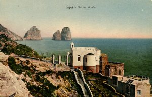 Italy - Capri. Faraglioni Island and Small Marina