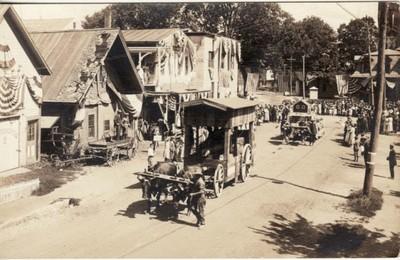 RPPC   OXEN DRAWN WAGON / PARADE  Patriotic Street Scene,...