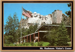 Postcard SD Mt. Rushmore Visitor's Center with US Flag