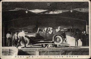 Amusement Park? Stunt Car Drives Over Man Japanese c1910 Postcard