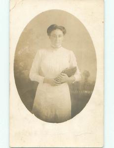 Bent Corner 1911 rppc YOUNG WOMAN HOLDING A LARGE BOOK o2188