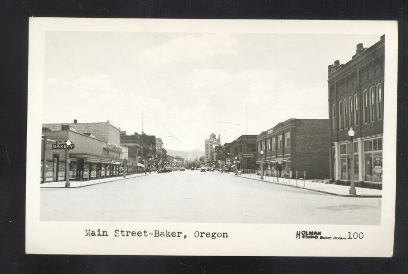 RPPC BAKER OREGON DOWNTOWN MAIN STREET SCENE OLD CARS REAL PHOTO POSTCARD