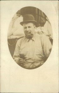 Pudgy Man Bowler Hat Smoking Pipe Holding Bottle TRENTON NJ STUDIO RPPC