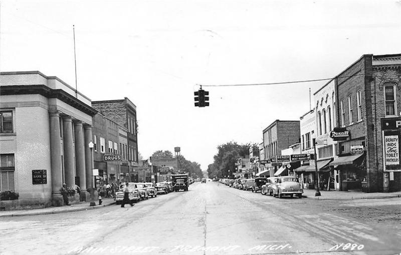 Fremont MI Street View Store Fronts Rexall Drugs Old Cars in 1959 RPPC Postcard