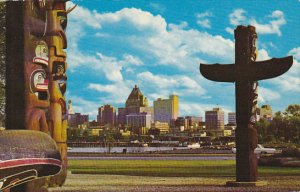 Canada Indian Totem Poles and Skyline Vancouver British Columbia