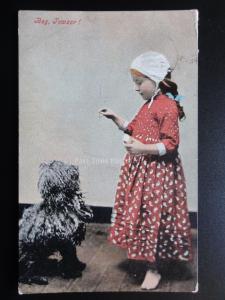 Child training her Dog 'BEG TOWZAR !' c1907
