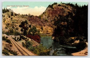 Cow Creek Canyon Oregon, Railroad Train Along a Stream  Postcard  P4