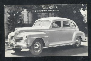 1942 PLYMOUTH 4 DOOR VINTAGE CAR DEALER ADVERTISING POSTCARD STORM LAKE IOWA