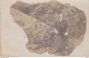 RP: HAMILTON , Ohio , 1907 ; Portrait of man sitting on a stump