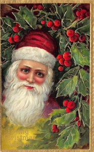 Loving Christmas Wishes Santa Claus Head Red Hat Ivy Berries Embossed Postcard