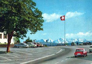 VINTAGE CONTINENTAL SIZE POSTCARD VIEW OF THE SWISS ALPS CARS 1970s