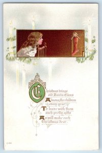1915 Christmas Message Child Girl Hanging Stocking With Doll Toy Postcard