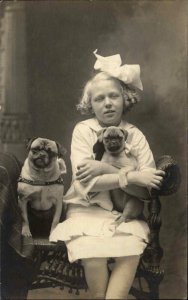 Little Girl & Pug Dogs in Studio Winthrop ME on Back Real Photo Postcard