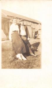 Lewiston Wisconsin? romantic couple on hay bale real photo pc Y11842