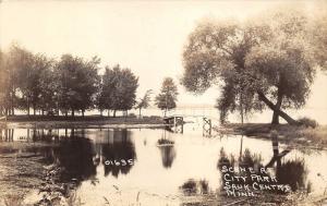 Sauk Centre Minnesota~City Park~Rustic Bridge Across Pond~1930s RPPC Postcard