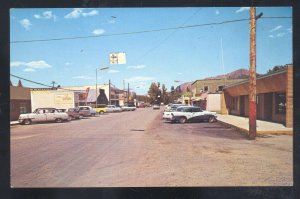 TWISP WASHINGTON DOWNTOWN STREET SCENE 1950's CARS VINTAGE POSTCARD