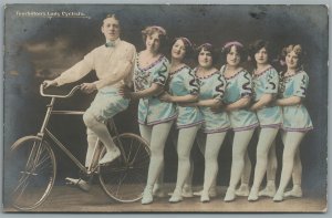 BICYCLE CIRCUS TOURBILLON'S LADY CYCLISTS ANTIQUE REAL PHOTO POSTCARD RPPC