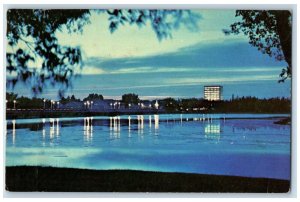 c1960's Dusk Falls on Albert Street Bridge, Regina Saskatchewan Canada Postcard