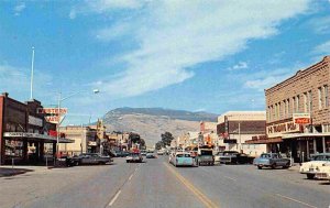 Street Scene Western Auto Sign Cody Wyoming 1960s postcard