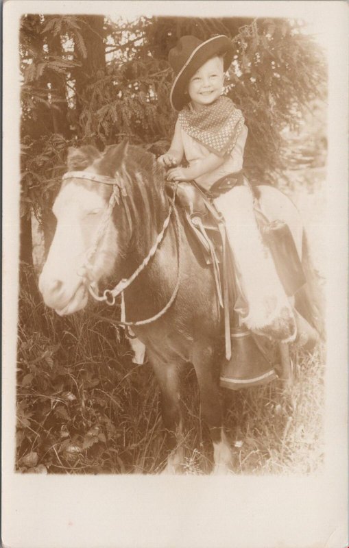 RPPC Postcard Little Boy Cowboy Costume  Riding Horse