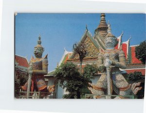 Postcard Statue of Giants watch in front of door of the Temple of Dawn, Thailand