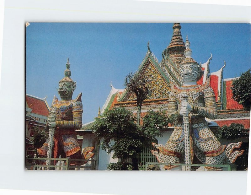 Postcard Statue of Giants watch in front of door of the Temple of Dawn, Thailand