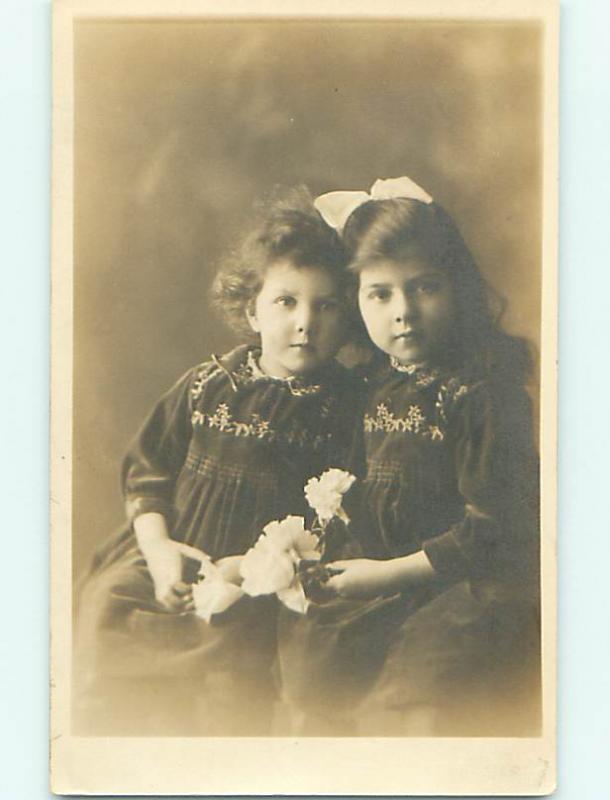 Circa 1910 rppc PRETTY GIRL WITH BOW IN HAIR WITH LITTLE SISTER r6725