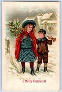 Christmas Postcard Children With Bell Houses Covered Snow Winter Embossed c1910s