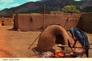 VINTAGE CONTINENTAL SIZE POSTCARD INDIAN WOMAN BAKING BREAD OUTDOOR OVENS