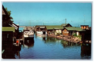 Fishing Village Docks Boats On Water Sitting At Leland Michigan MI Postcard