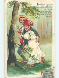 Pre-Linen foreign FRENCH WOMAN CARRIES UMBRELLA BESIDE MAN IN FOREST HL7801