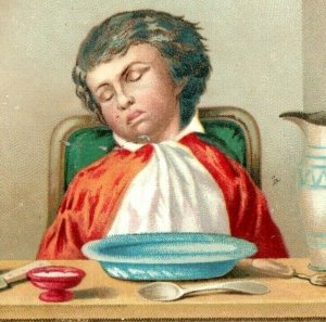 Cartão comercial vitoriano da década de 1880 criança dormindo à mesa P229-