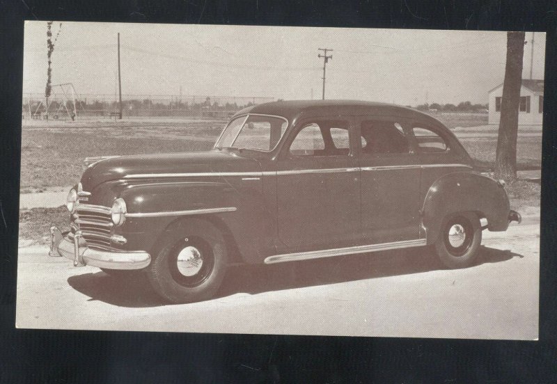 1946 PLYMOUTH 4 DR SEDAN VINTAGE CAR DEALER ADVERTISING POSTCARD MOPAR