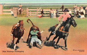 VINTAGE POSTCARD MIKE HASTINGS BULLDOGGING RODEO SCENE