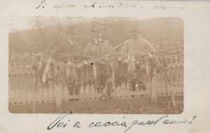 RPPC Postcard Men Hunting Trip Lots of Dead Rabbits 1913