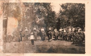 Vintage Postcard Boys Pictorial Riding On The Elephant's Back White Uniform RPPC