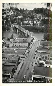 Ross Hall RPPC H-94 Bonner's Ferry ID & Kootenai Bridge, Signs & Gas Stations