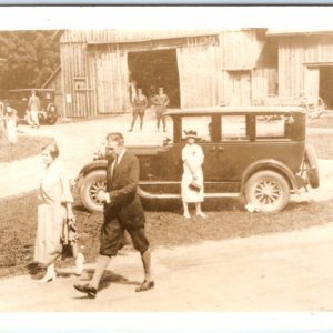 c1920s Odd Parked Car by Barn RPPC Military Men Woman Party Hat Real Photo A134