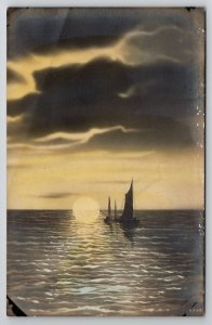 RPPC Seascape Cloudy Skies Sailboats Sun On Ocean Real Photo Postcard B47